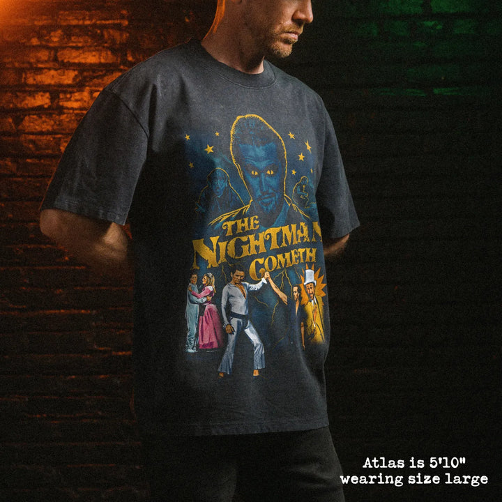 Male model wearing stone wash heavy tee with nightman graphic 