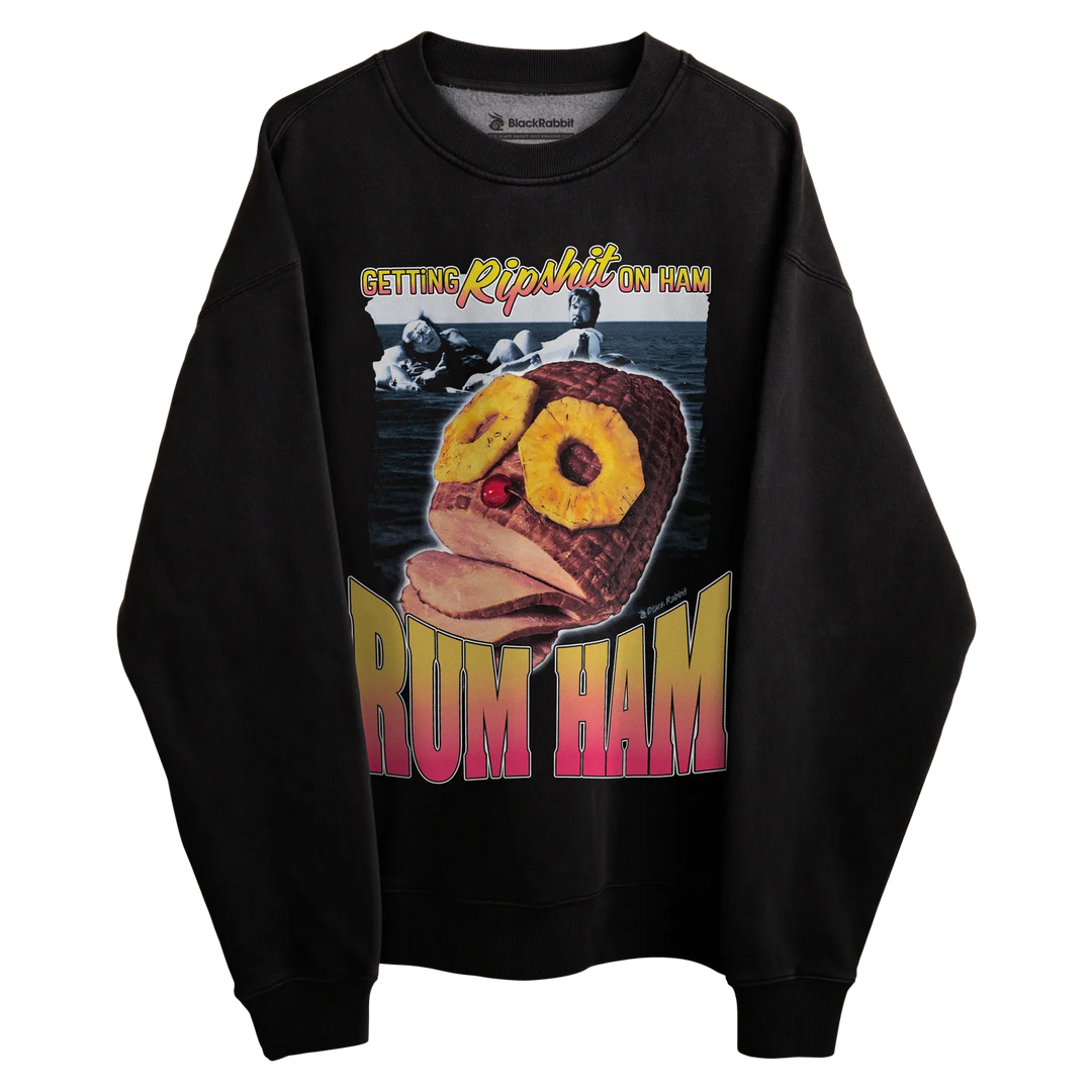 Black crewneck sweatshirt with pineapple design and text ’rum ham’ in pink, yellow, green, blue, red, purple.