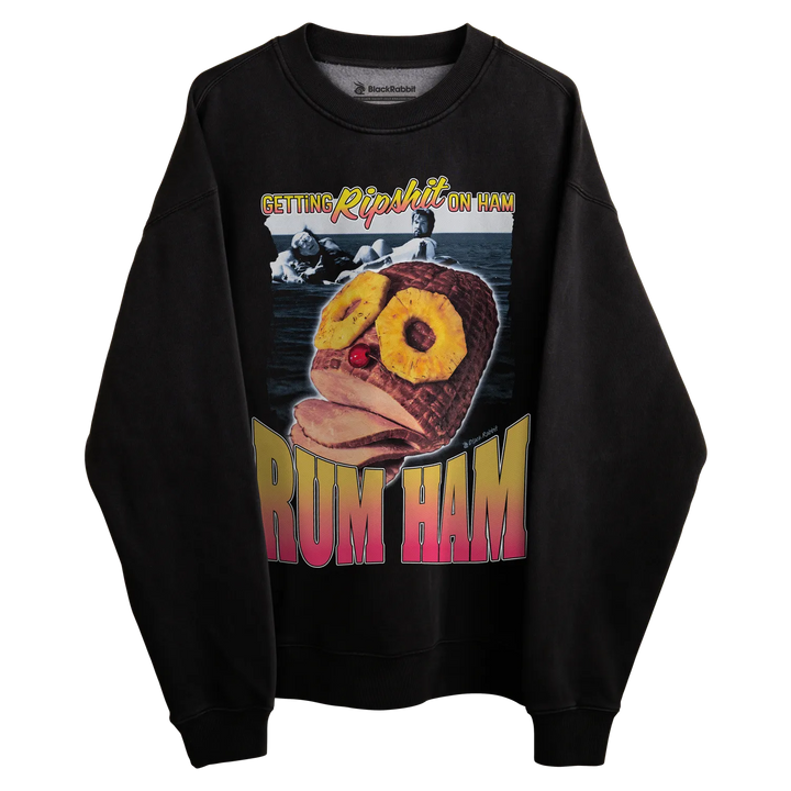 Black crewneck sweatshirt with pineapple design and text ’rum ham’ in pink, yellow, green, blue, red, purple.