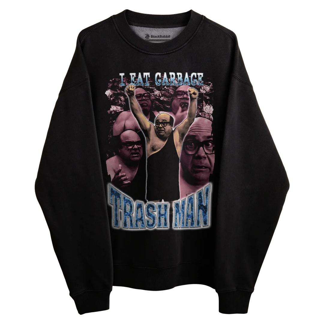 Black long-sleeved sweatshirt with graphic design featuring ’trash man’ and ’i eat garbage’ text, multiple faces printed on the front.