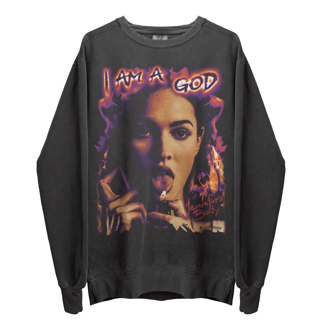 Dark grey crewneck sweatshirt with a graphic print of a woman sticking out her tongue, surrounded by flames and the text ’I AM A GOD’.