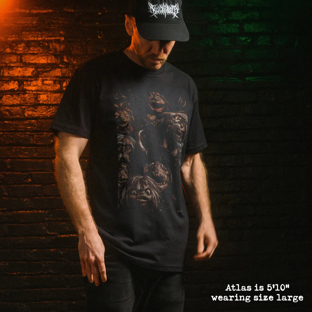 Male model wearing black premium tee with goblins graphic 