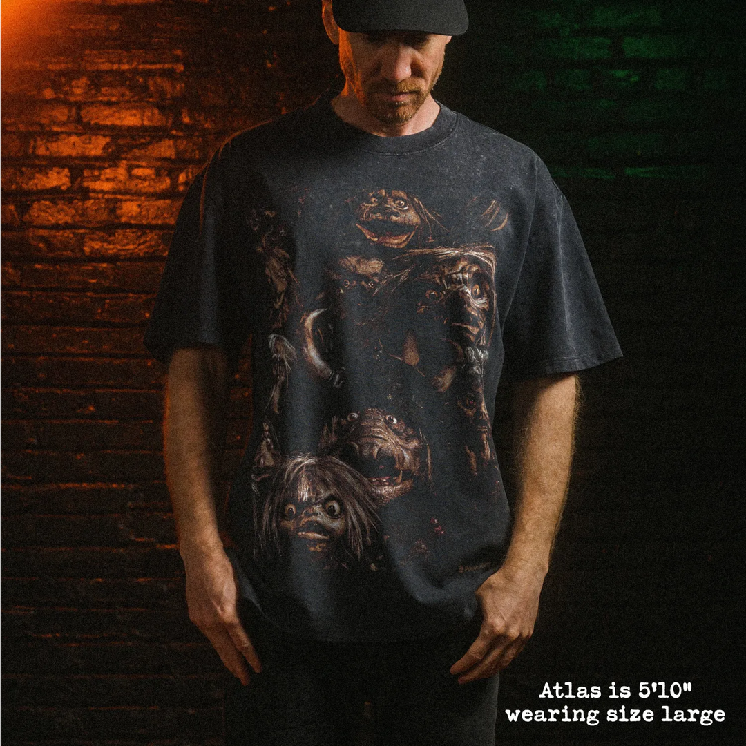 Male model wearing stone wash heavy tee with goblins graphic 