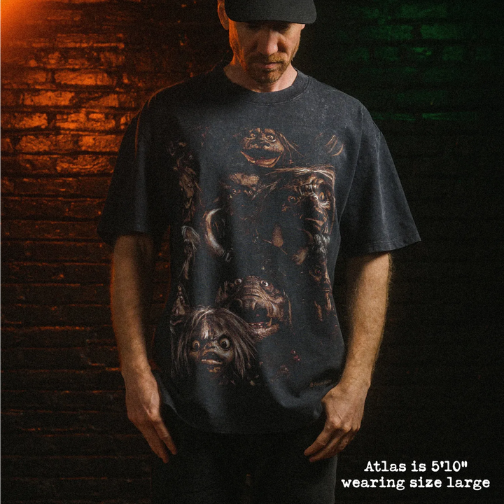 Male model wearing stone wash heavy tee with goblins graphic 