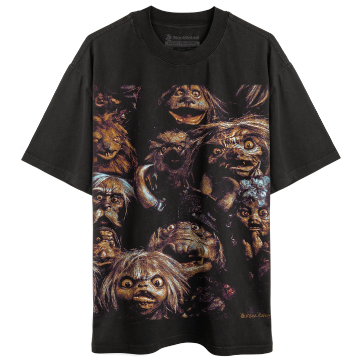 Black t-shirt featuring a graphic print of various creature faces.