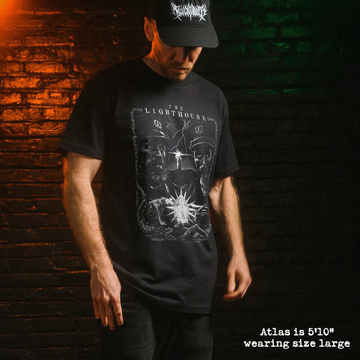 Male model wear soft premium tee with lighthouse graphic
