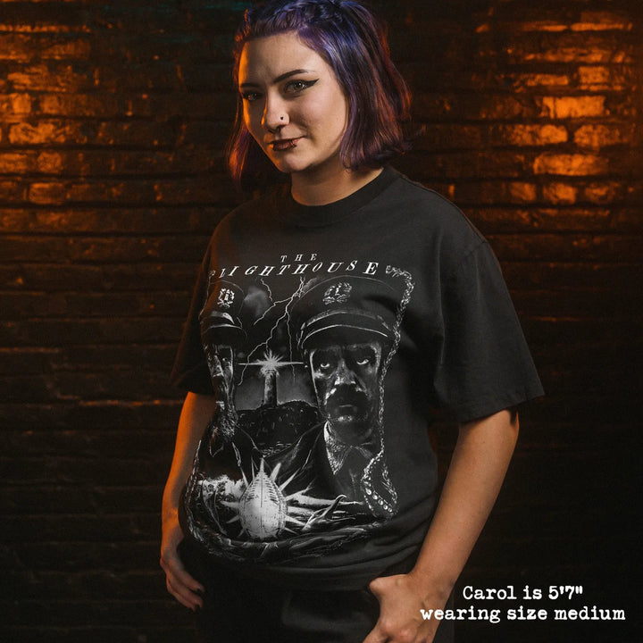 Model wearing heavy tee with lighthouse graphic 