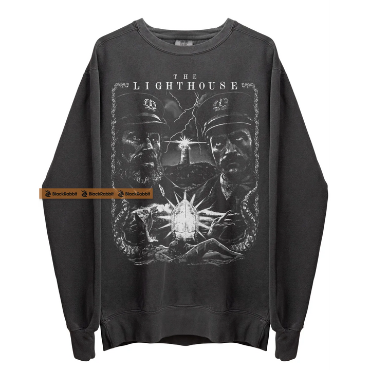 Gray sweatshirt with ’The Lighthouse’ graphic.