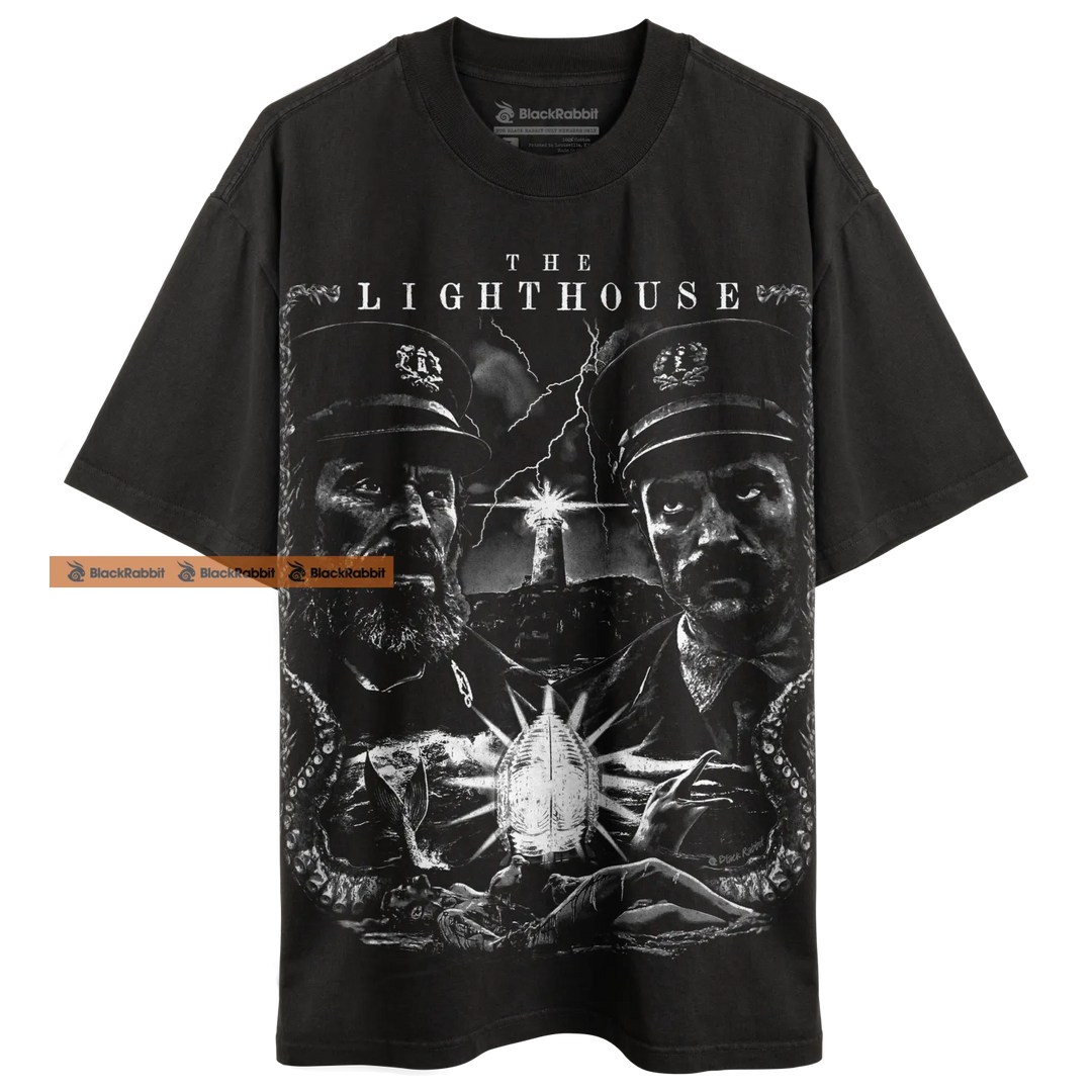 Black t-shirt with ’The Lighthouse’ graphic.