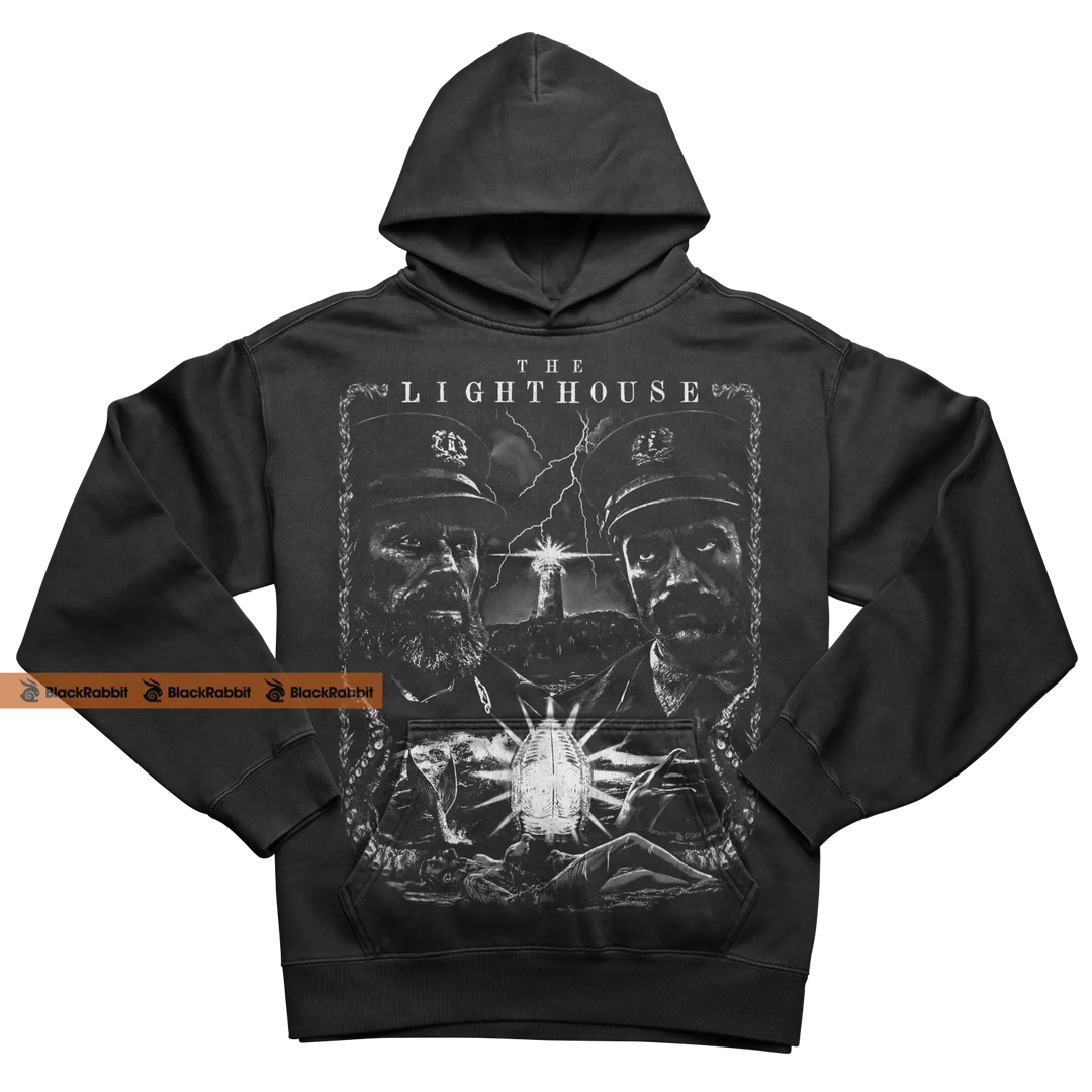 Black hoodie with ’The Lighthouse’ graphic.