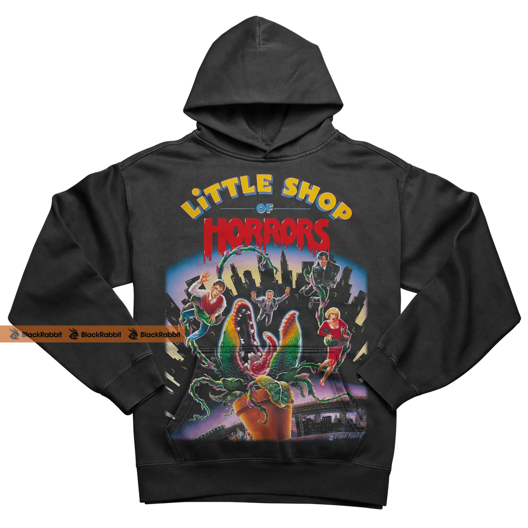 Black hoodie with ’Little Shop of Horrors’ graphic.