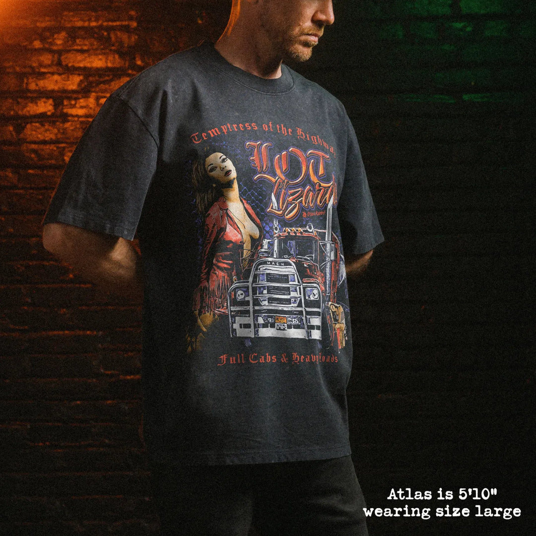 Male model wearing stone wash heavy tee with lot lizards graphic 