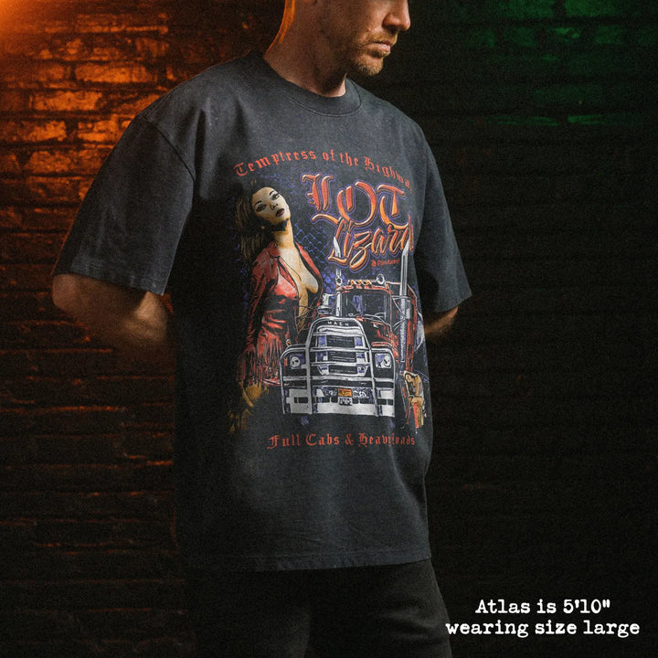 Male model wearing stone wash heavy tee with lot lizards graphic 