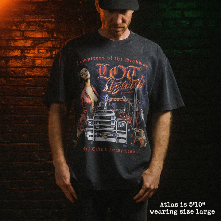 Male model wearing stone wash heavy tee with lot lizards graphic 