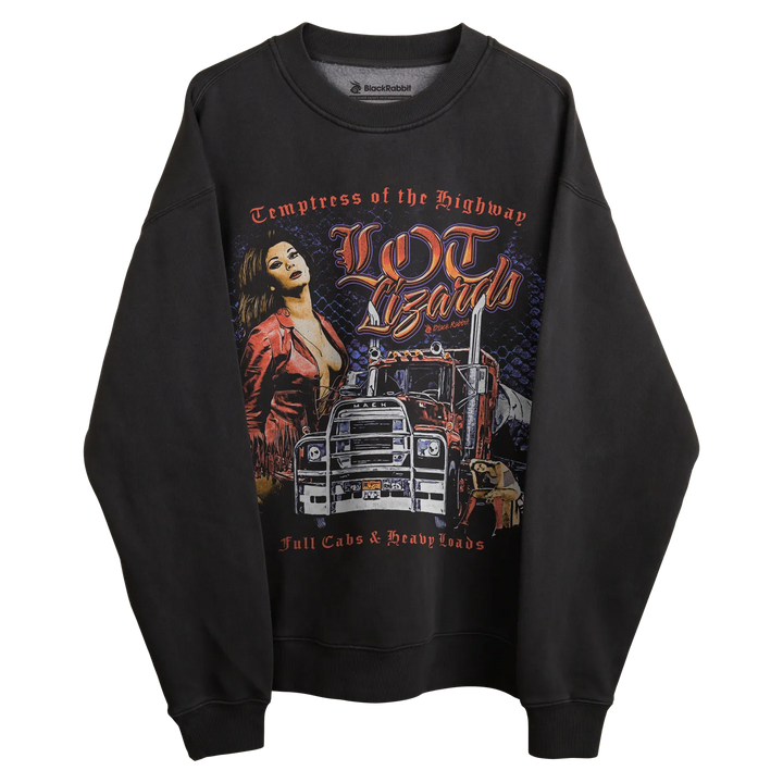 Black long-sleeved sweatshirt with graphic design of a woman and truck, featuring the text ’temptress of the highway’ in orange.