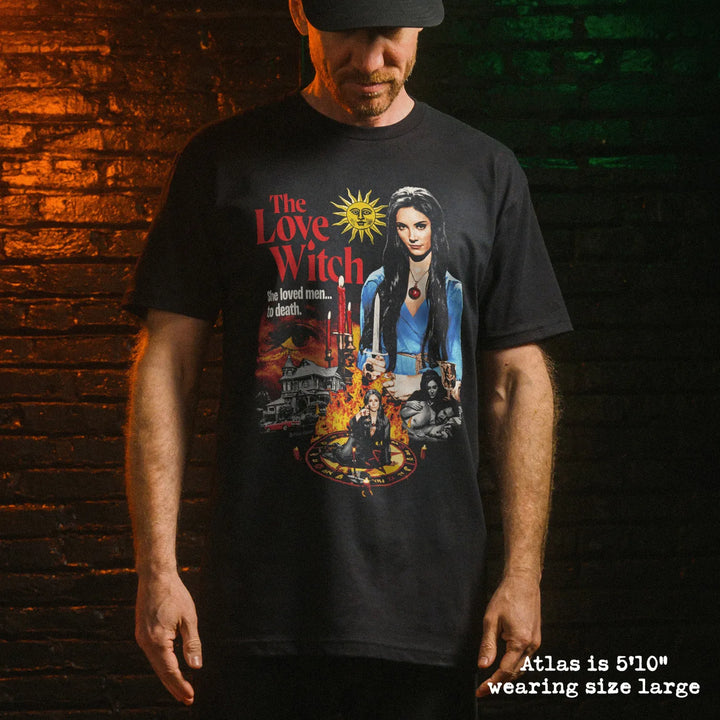 Black cotton unisex classic t-shirt featuring vibrant red orange and blue love witch movie poster graphic