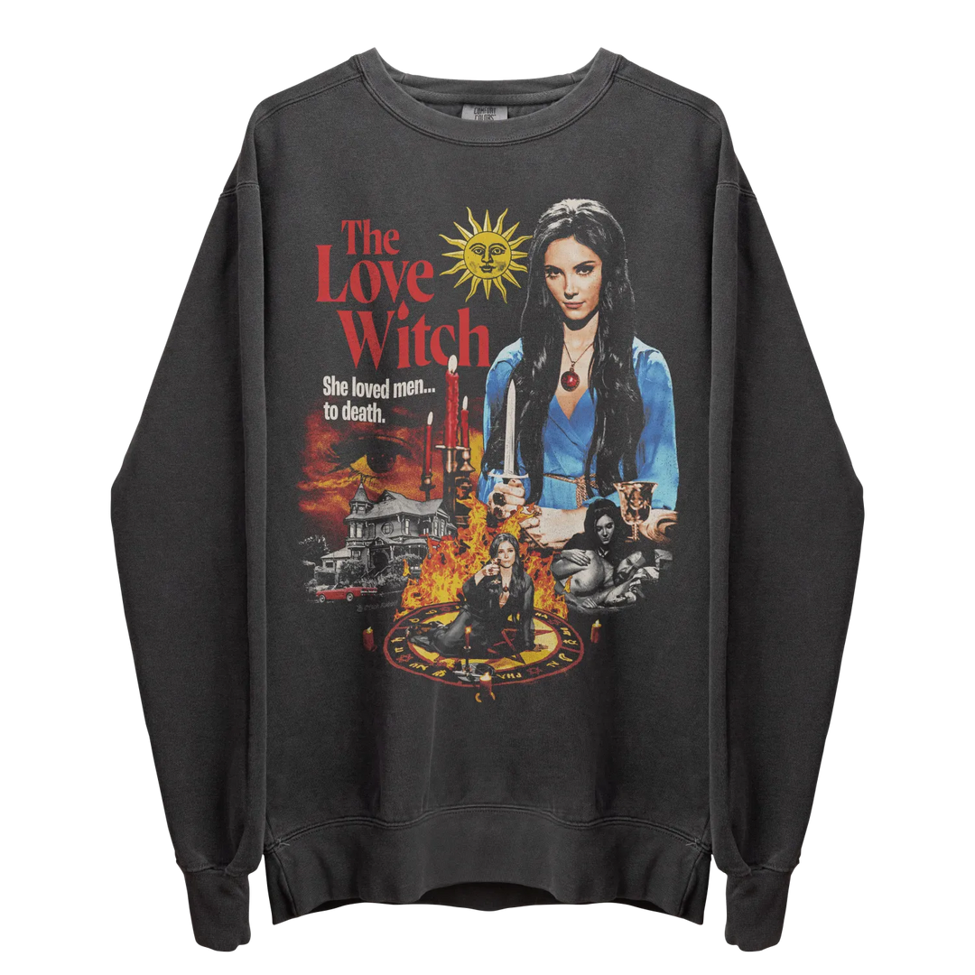 A dark gray long-sleeved crewneck sweatshirt featuring a graphic print inspired by the movie ’The Love Witch.’