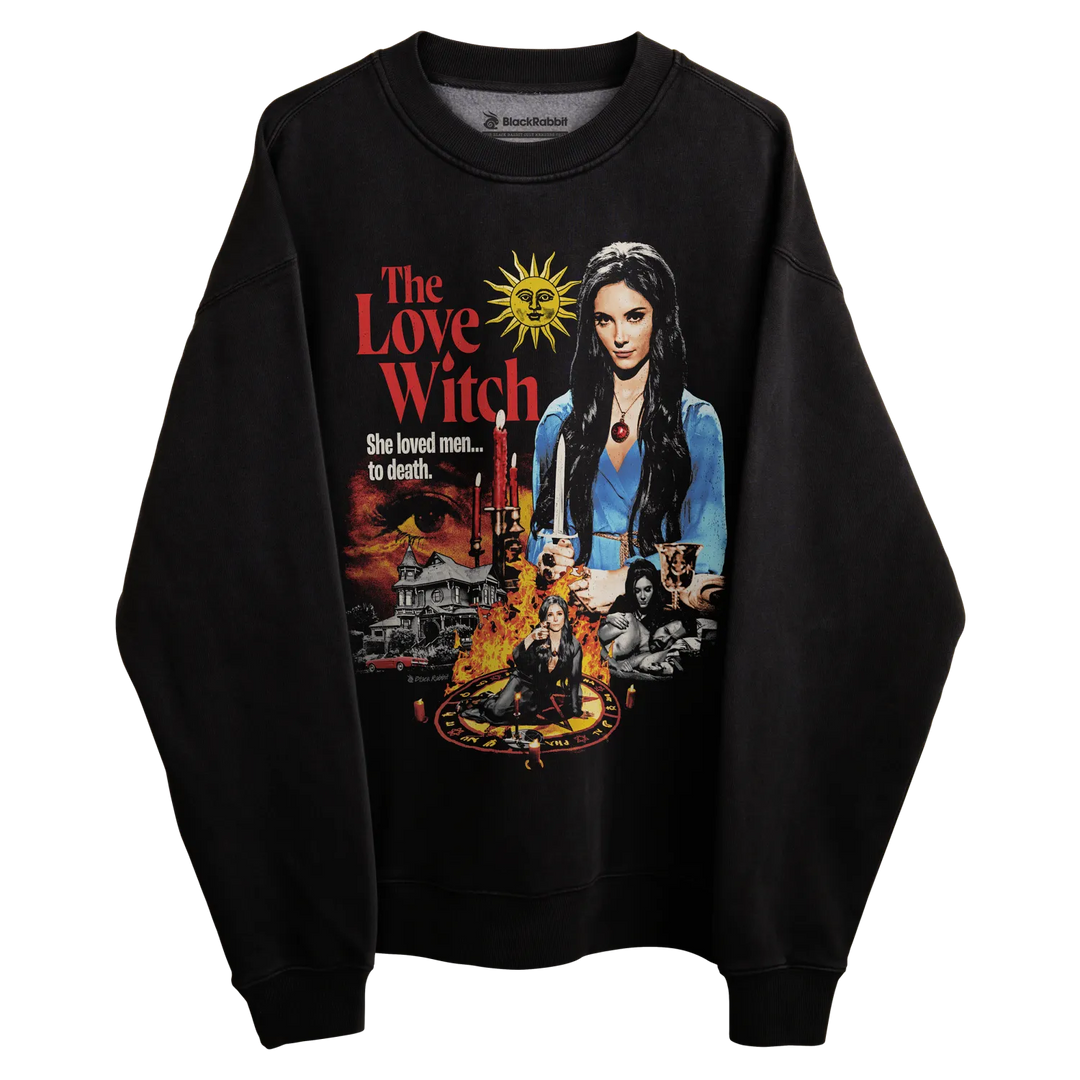 Black sweatshirt with ’the love witch’ design featuring a witch character and movie poster elements.