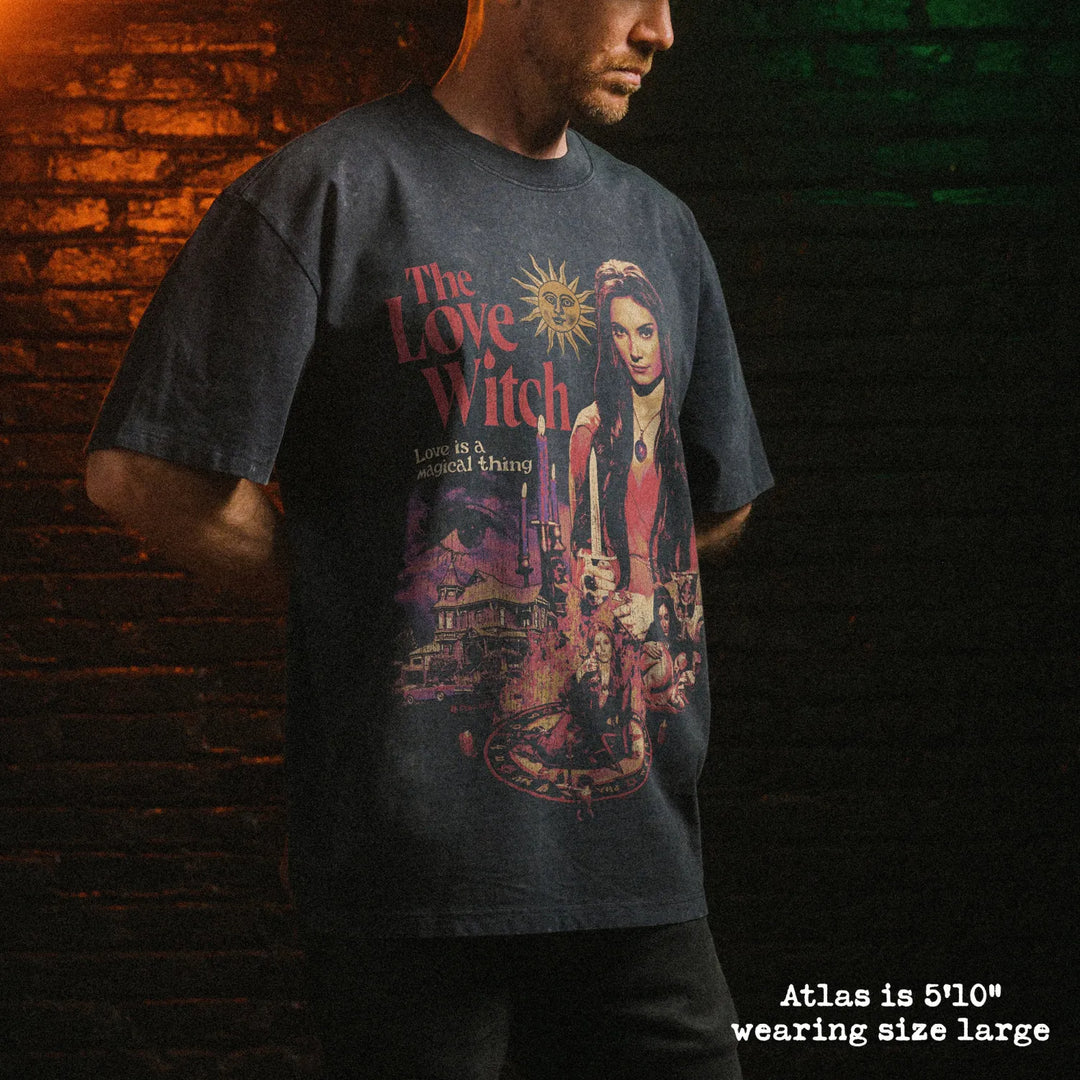 Male model wearing stone wash heavy tee with love witch graphic 