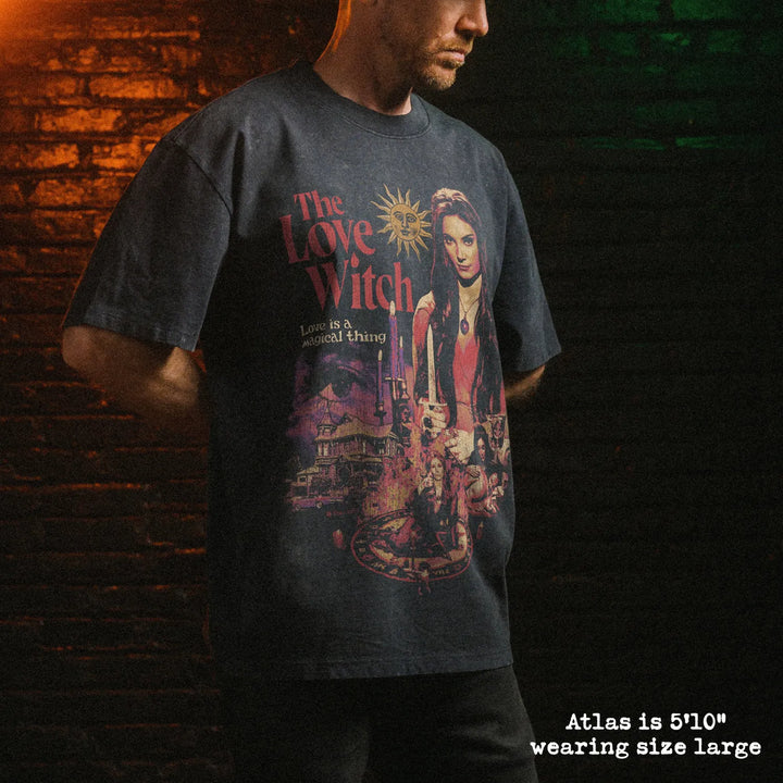 Male model wearing stone wash heavy tee with love witch graphic 