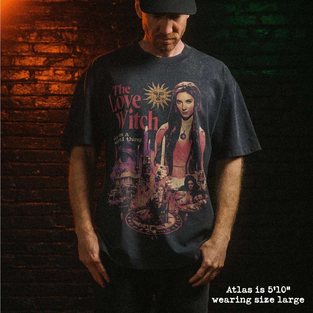 Male model wearing stone wash heavy tee with love witch graphic 