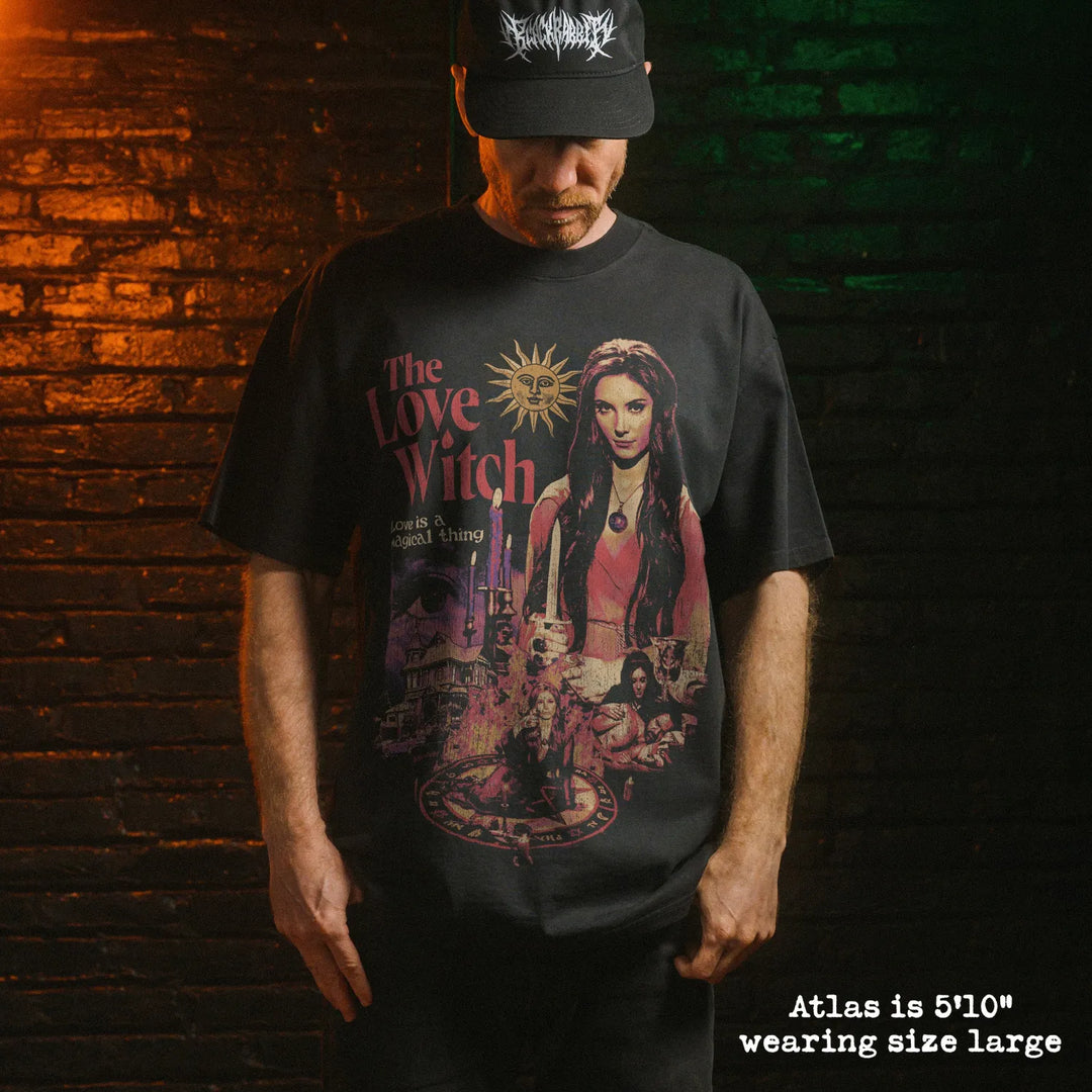 Model wearing heavy tee with love witch graphic 