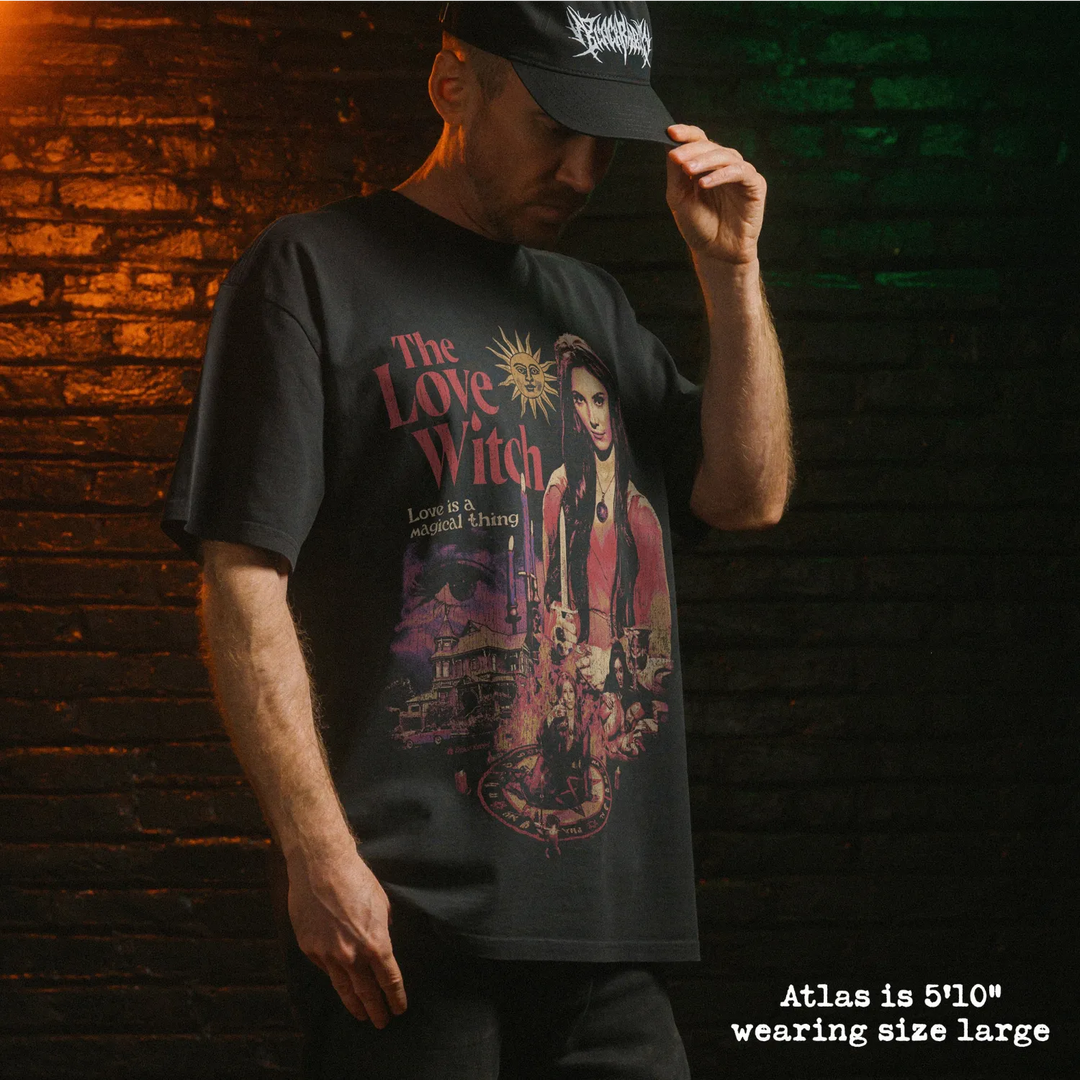Model wearing heavy tee with love witch graphic 