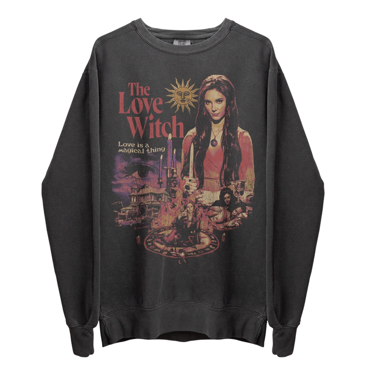 Dark grey crewneck sweatshirt with a colorful ’The Love Witch’ graphic print.