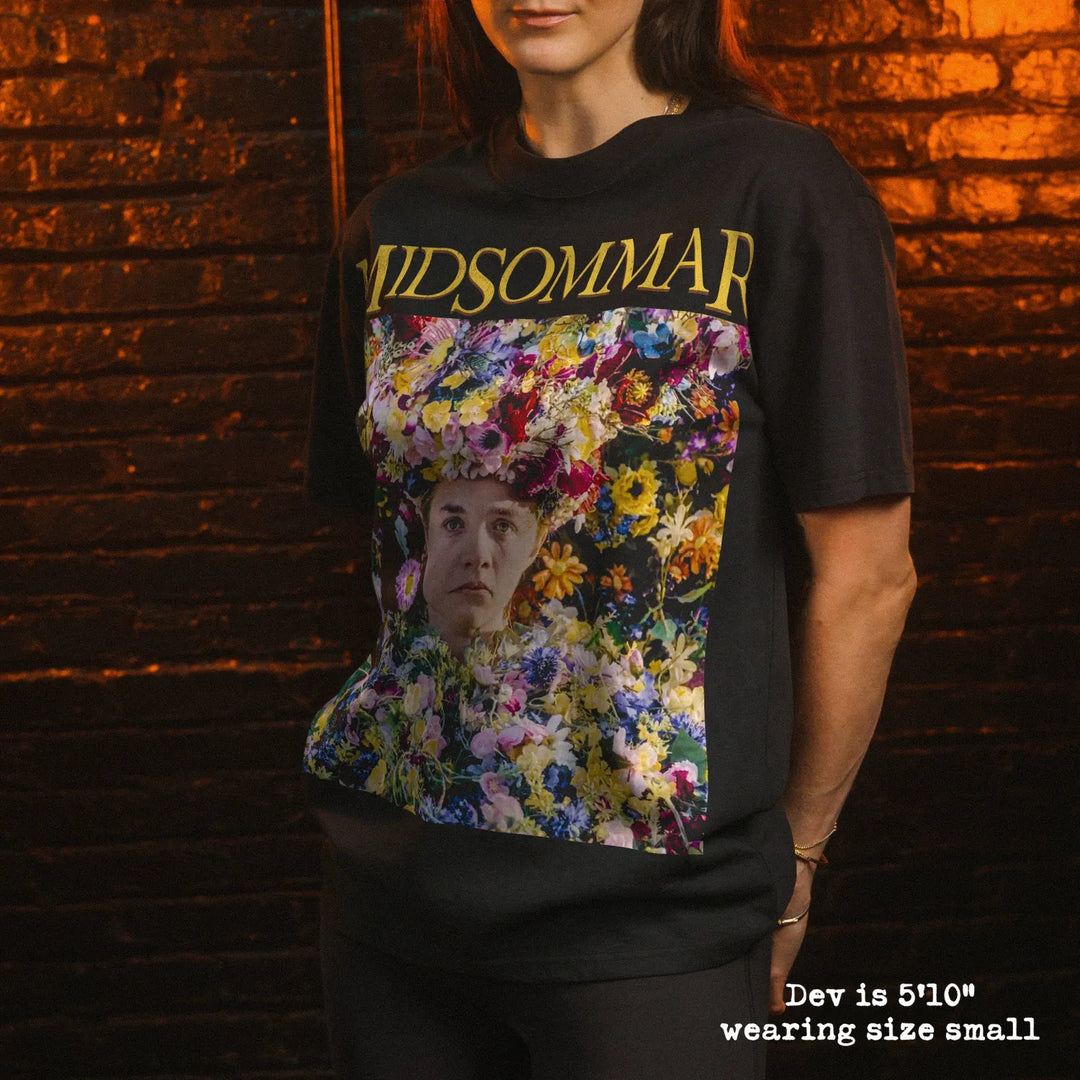Model wearing heavy tee with midsommar flower dress graphic 