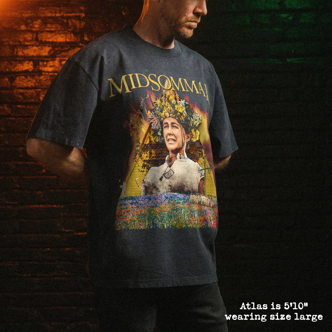 Male model wearing stone wash heavy tee with midsommar graphic 