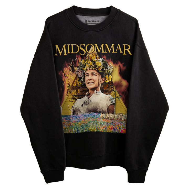 Black crewneck sweatshirt with ’midsommar’ graphic design featuring a woman in traditional attire surrounded by flames and flowers.