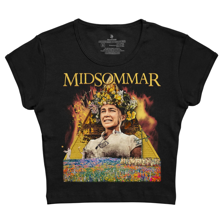 Black short-sleeved t-shirt featuring a graphic print of the movie ’midsommar’ with golden text and an image of a woman in a floral crown against a fiery, colorful background.