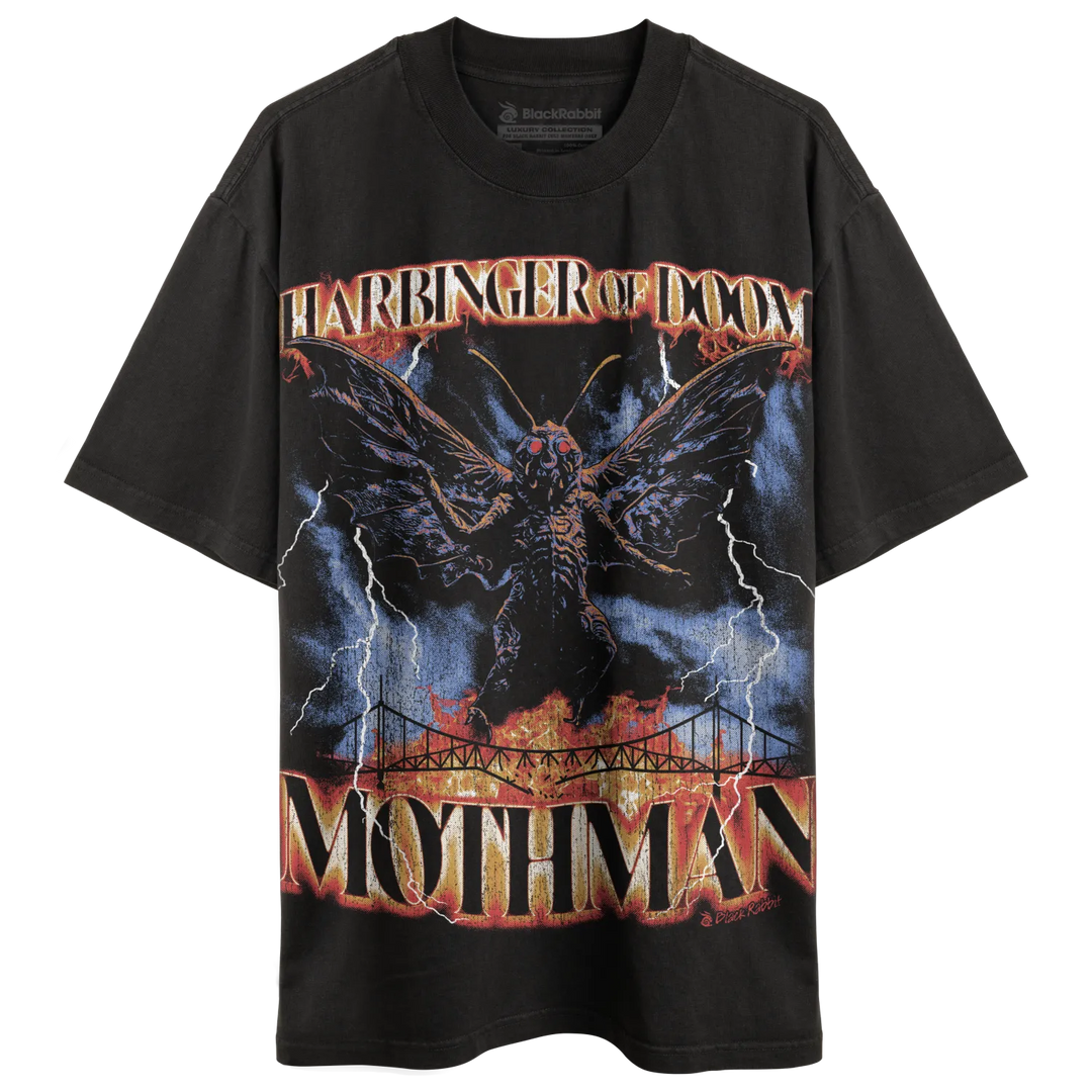 Black graphic t-shirt with a ’Mothman’ design.