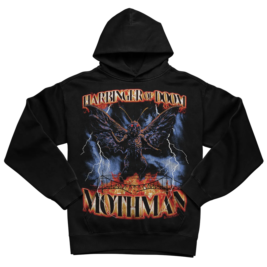 Black mothman hoodie with lightning bolt design and text ’harbinger of doom’ on front.