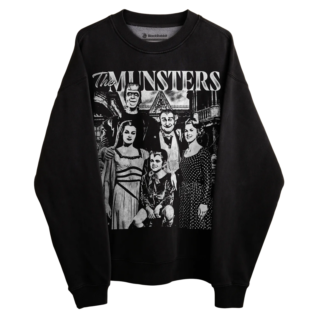 Black crewneck sweatshirt with the munsters family design, featuring the iconic characters in a monochrome illustration.