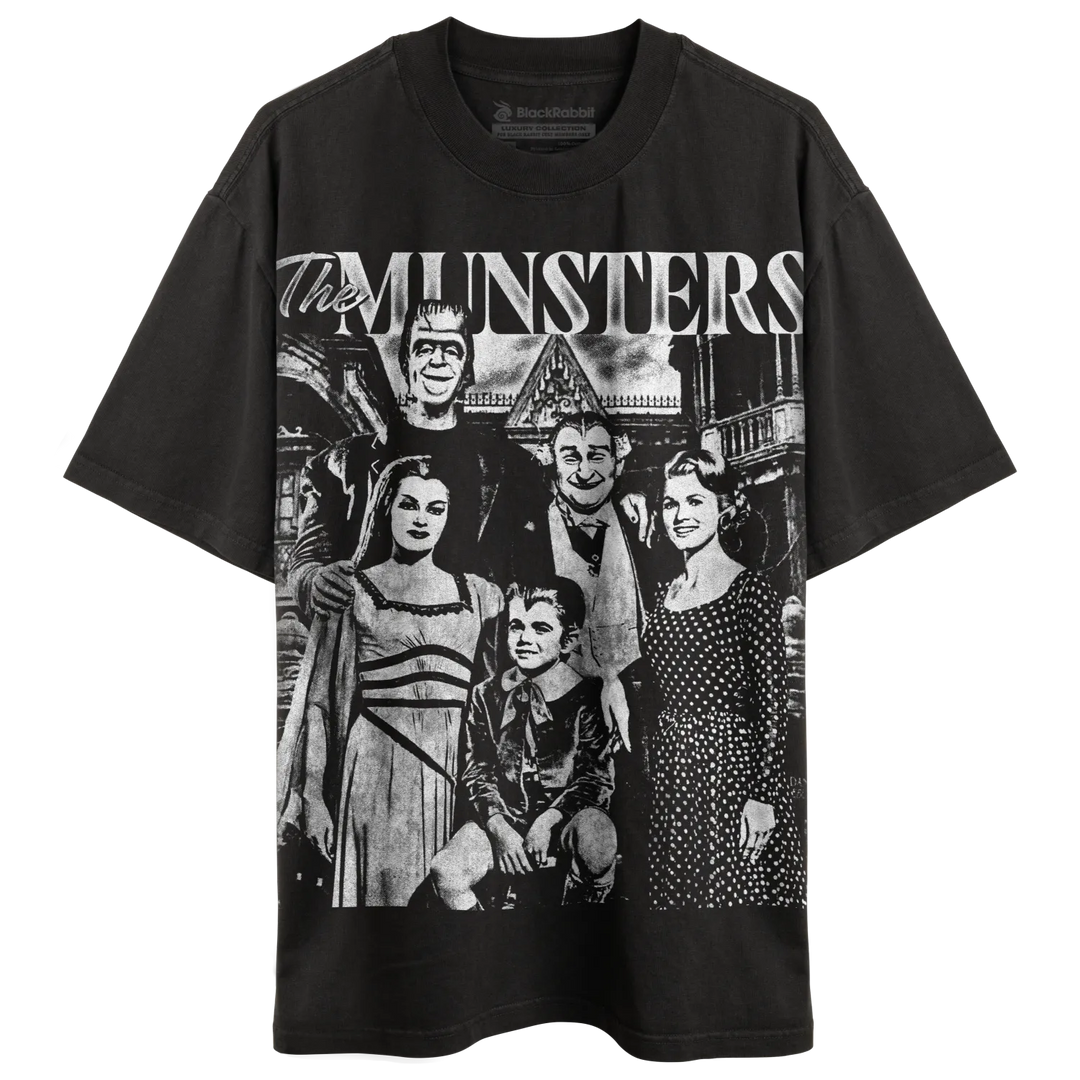 Black t-shirt with a monochrome graphic print of The Munsters family.