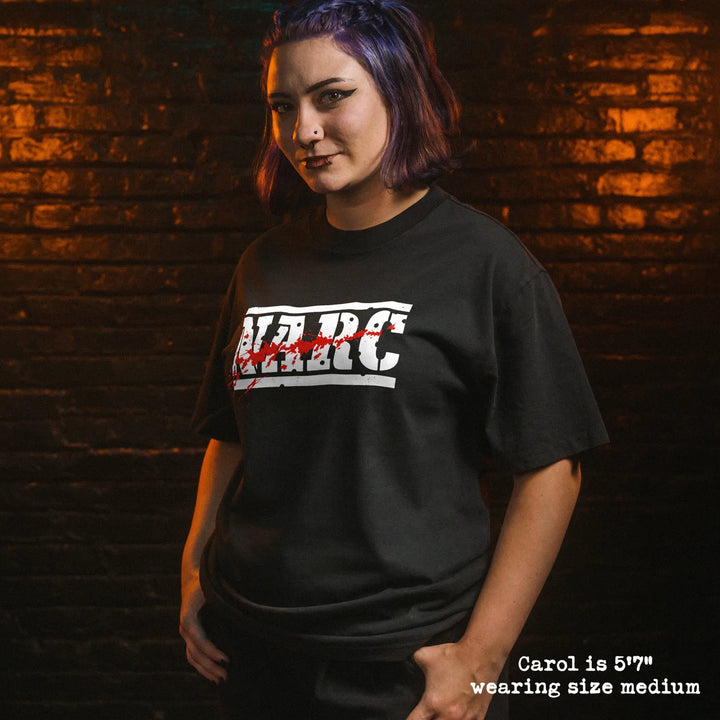Model wearing heavy tee with narc graphic 