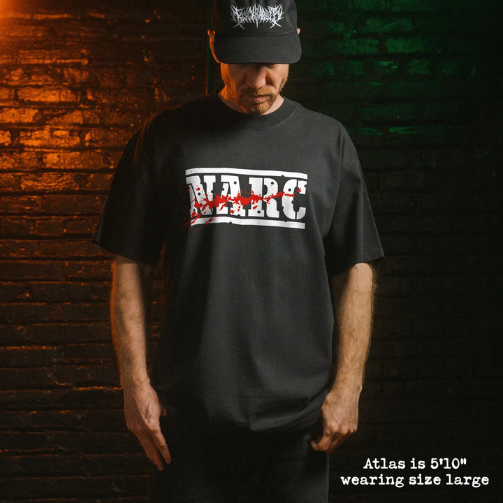 Model wearing heavy tee with NARC graphic 