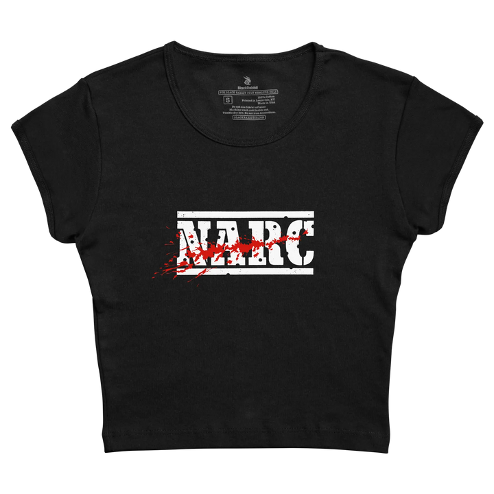 Black cropped t-shirt with bold white narc graphic and red splatter effects made from preshrunk combed fabric for arcade game fans