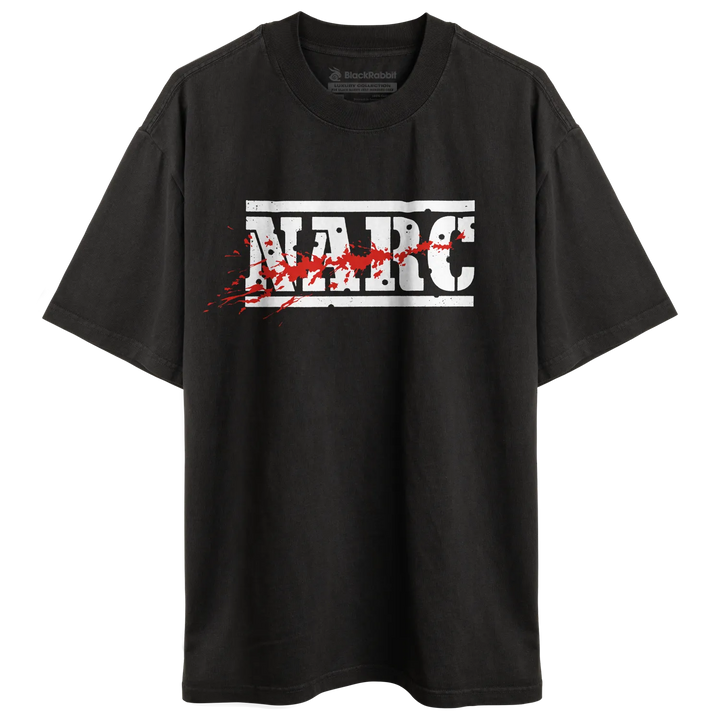 Black short-sleeved preshrunk combed t-shirt with bold white narc arcade game logo and red splatter effects vintage retro gaming