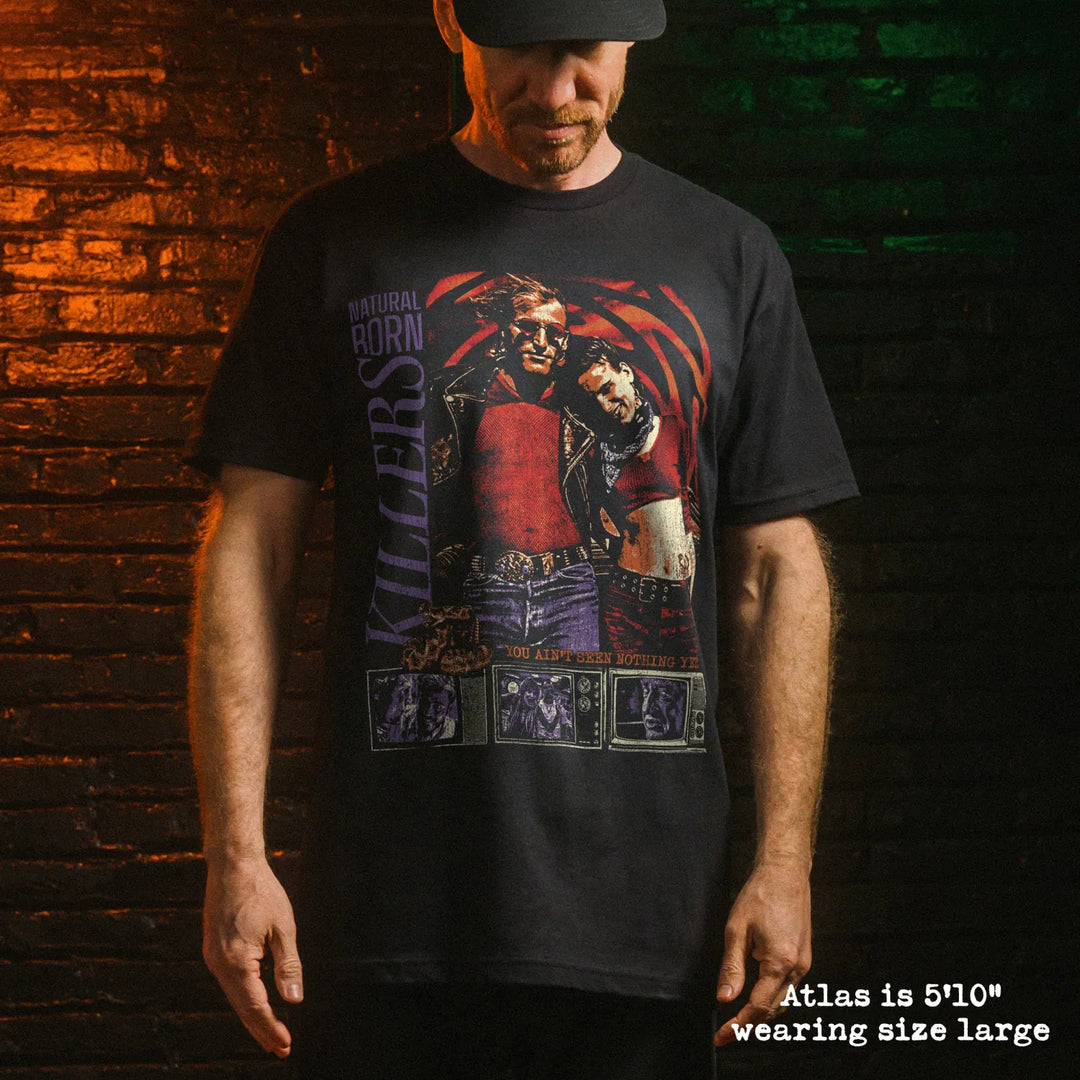 Male model wear soft premium tee with natural born killers graphic

