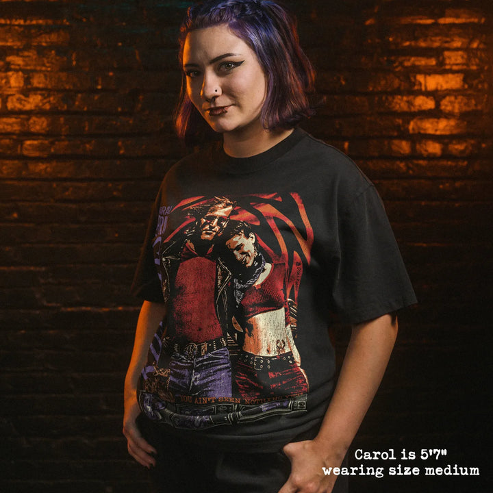 Model wearing heavy tee with natural born killers graphic 