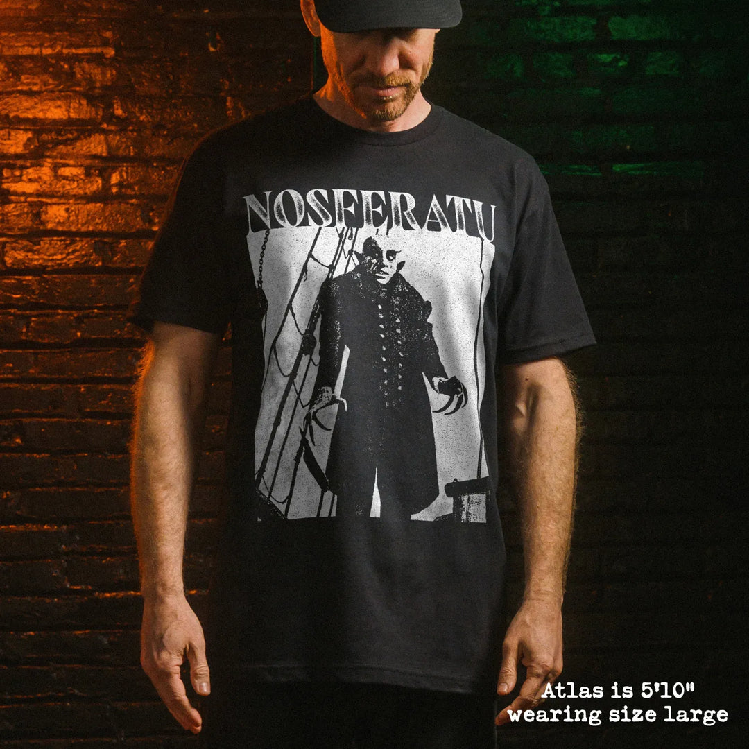 Male model wear soft premium tee with nosferatu graphic
