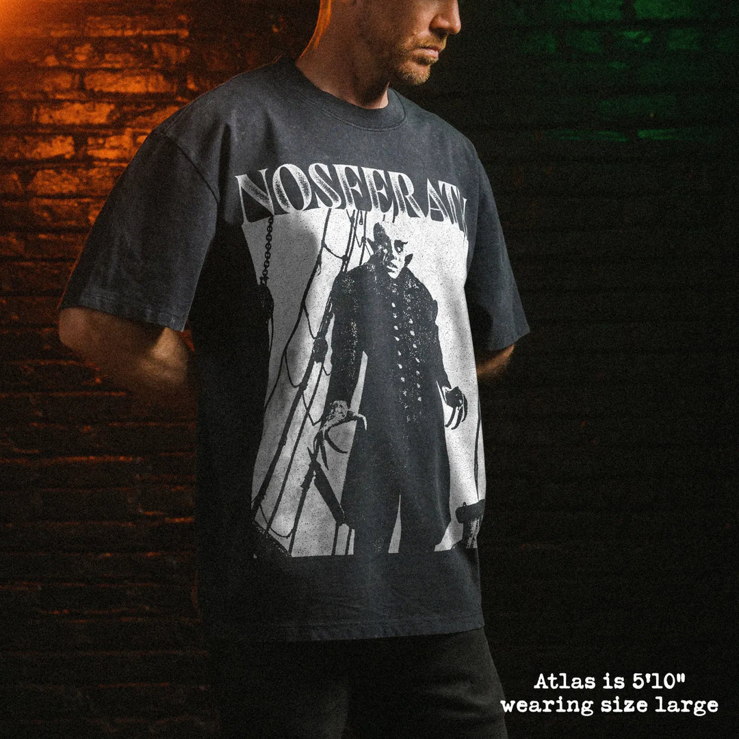 Male model wearing stone wash heavy tee with nosferatu graphic 