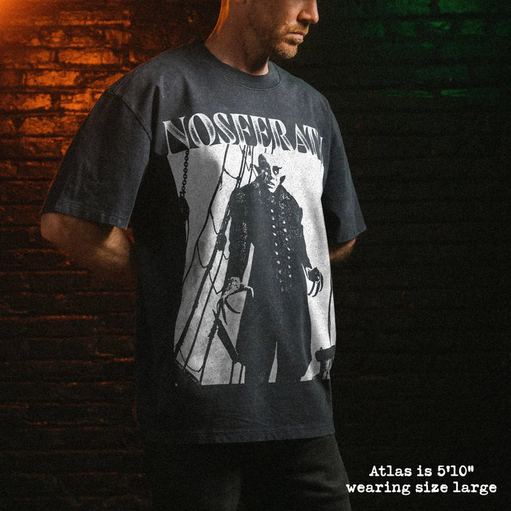 Male model wearing stone wash heavy tee with nosferatu graphic 