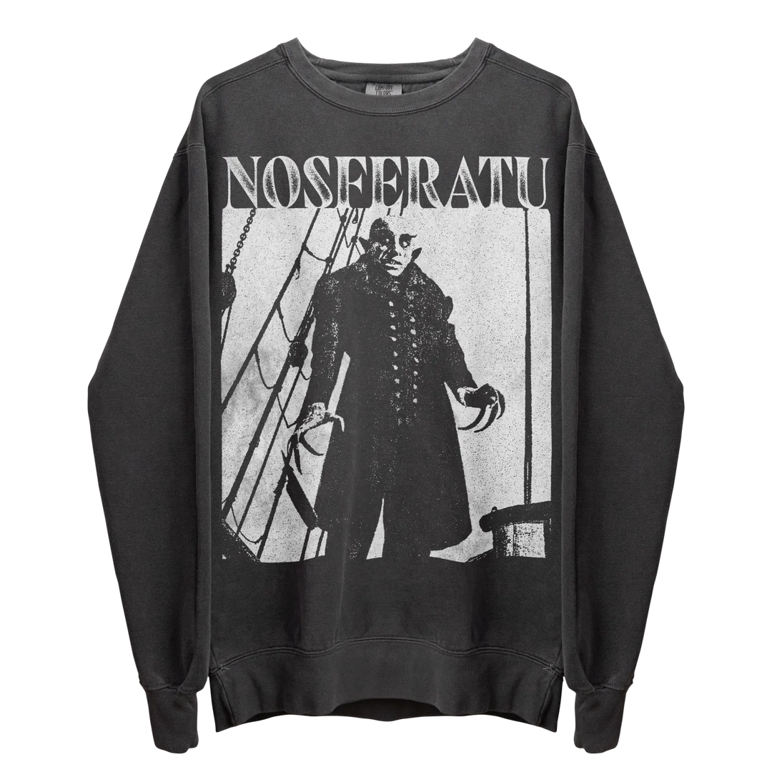 Black long-sleeved crew-neck sweatshirt with a large white graphic print of Count Orlok from Nosferatu.