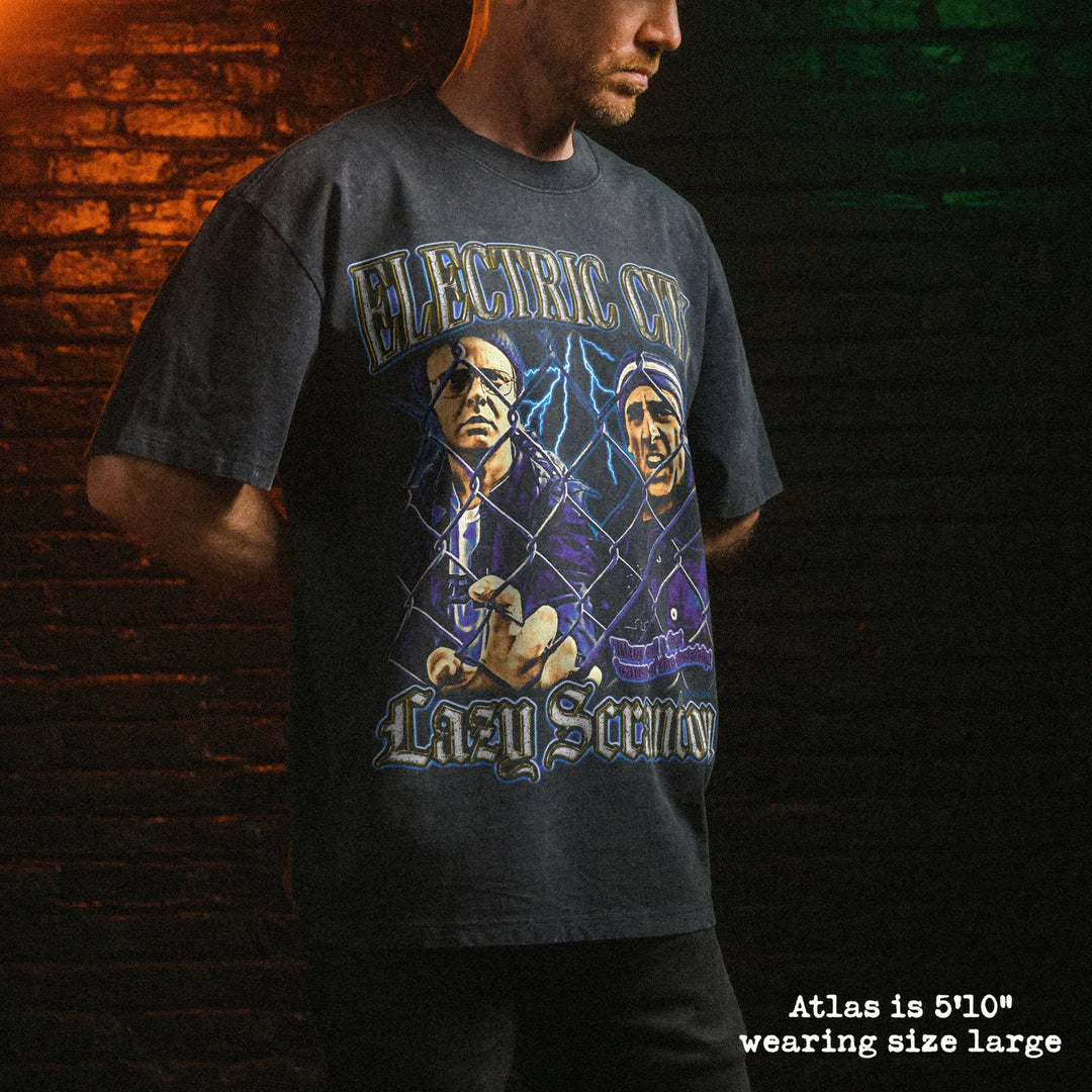 Male model wearing stone wash heavy tee with electric city graphic 