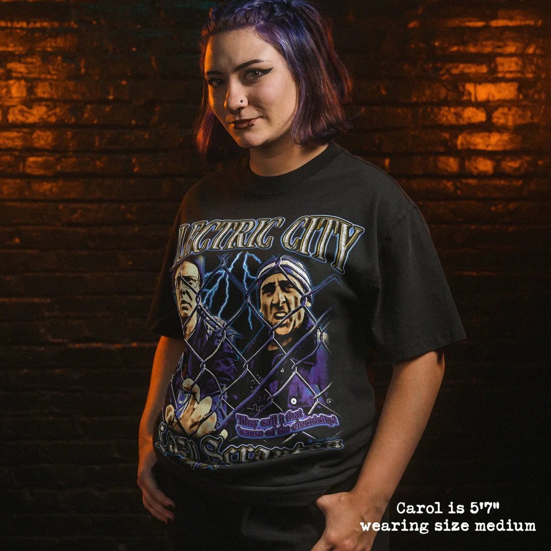 Model wearing heavy tee with electric city graphic 