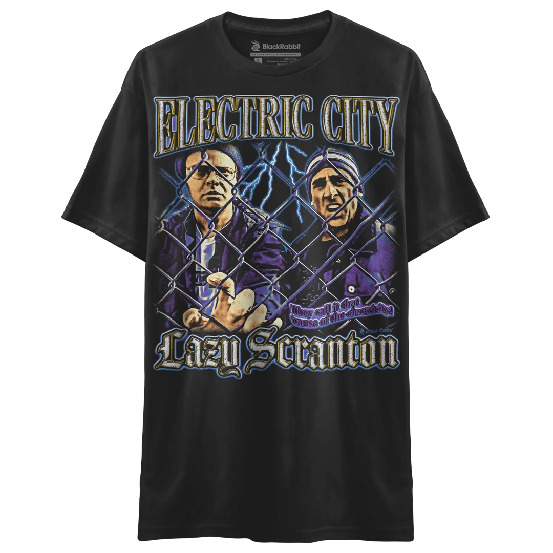 Black graphic t-shirt featuring two men behind a chain-link fence with lightning bolts and the text ’ELECTRIC CITY LAZY SCRANTON’.
