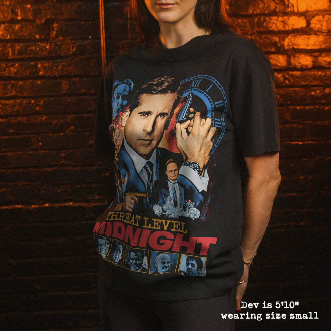 Model wearing heavy tee with threat level graphic 